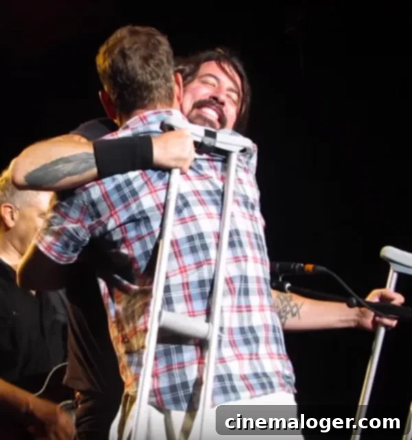 Dave Grohl shares the stage with an overwhelmed fan 1 featured 1806238
