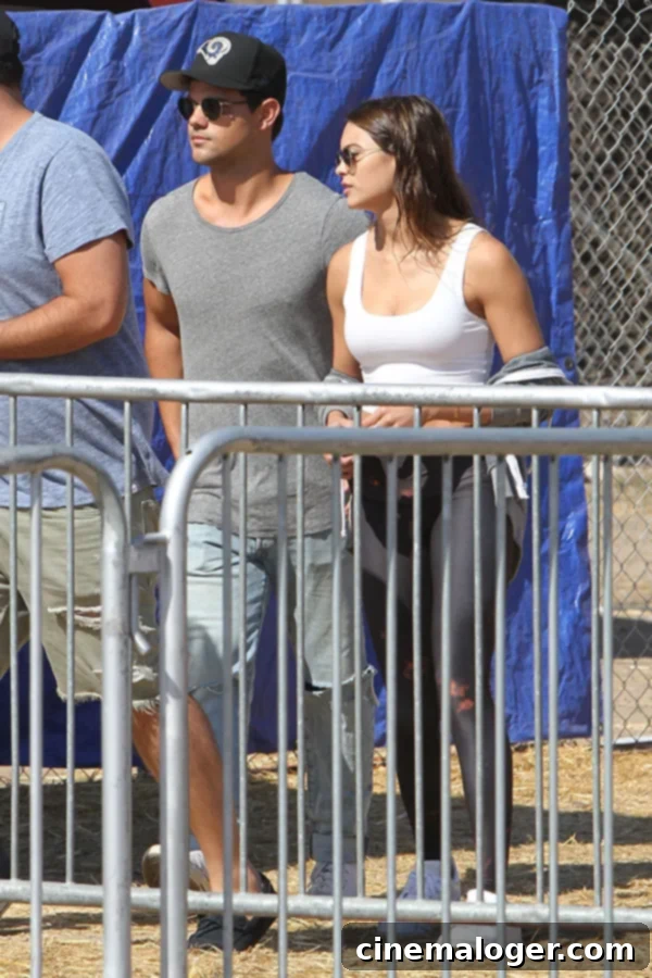 Taylor Lautner Packs On Public Affection With Model Kyra Santoro 1 featured 2250699