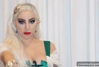 Lady Gaga Ignites The Holidays As A Sizzling Elf In Green Corset And Candy Cane Stockings