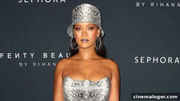 Rihanna Stuns in a Bold Snakeskin Mini, All Legs and Cleavage 1 featured 3339764