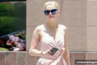 Amber Heard’s High Slit Wrap Dress Skirts Disaster