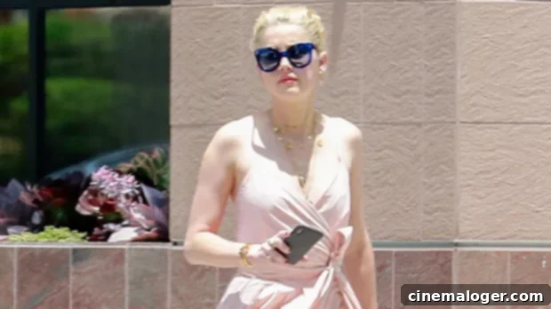 Amber Heard's High Slit Wrap Dress Skirts Disaster 1 featured 3660466