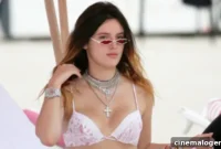 Bella Thorne Sizzles In A White Bikini, Showcasing Her Toned Physique