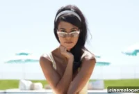 Kourtney Kardashian, 40, Radiates in Yellow Swimwear for Poosh Pool Bash