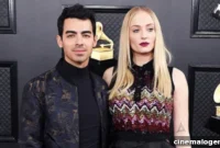 Sophie Turner Electrifies The Grammys In A Bold Black Mini Dress