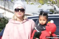 True Thompson Adorable Tricycle Ride With Hair Buns