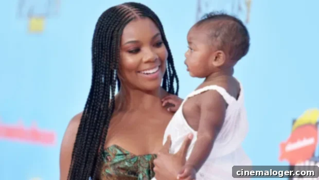 Gabrielle Union, 47, Dazzles in Rainbow Bikini, High-Fives Kaavia at Backyard Picnic 1 featured 4058806