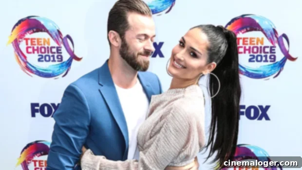 Nikki Bella and Artem Chigvintsev Snuggle Up on Adorable Beach Date With Newborn Matteo 1 featured 4182978