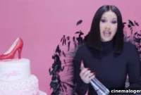 Cardi B’s Iconic Award Lick in Feathered Elegance
