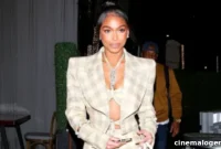 Lori Harvey Rocks Plaid Crop Top and Skirt for Solo Night