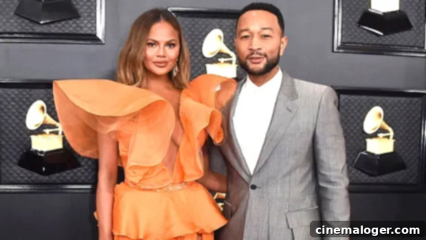 Chrissy Teigen Dazzles in Purple Sari with John Legend for Diwali Celebration 1 featured 4575181