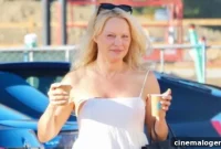 Pamela Anderson, 54, Stuns Makeup-Free in White Dress During Malibu Coffee Run