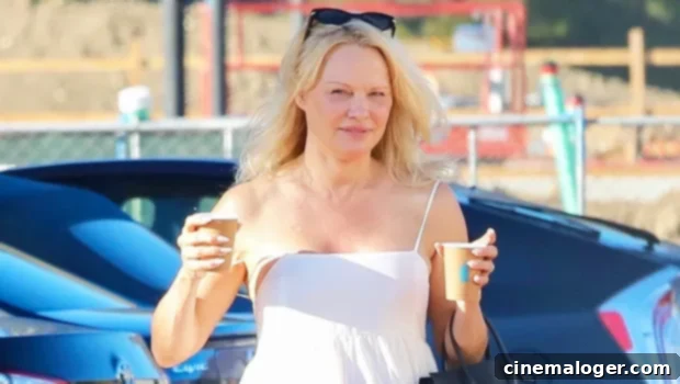 Pamela Anderson, 54, Stuns Makeup-Free in White Dress During Malibu Coffee Run 1 featured 4579785