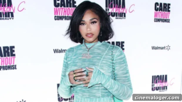Jordyn Woods Wows in a Vibrant Micro Bikini by the Pool 1 featured 4738701