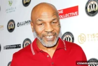 Iron Mike, 56, Navigates Airport in Wheelchair with Walking Stick