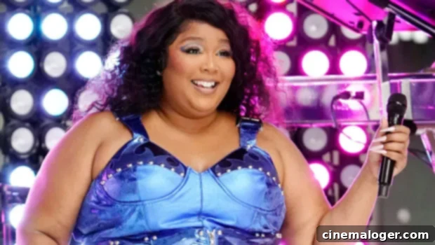 Lizzo Confidently Rocks Sheer Pink Jumpsuit with Pastel Thong in Sizzling New Video 1 featured 4820471