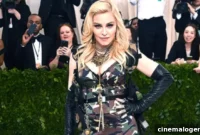 Madonna Celebrates 64 in Daring Lowcut Dress and Fishnets