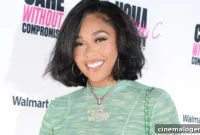 Jordyn Woods Dazzles in a Vibrant Green Swim Set on Her Jamaica Getaway