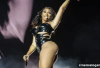 Megan Thee Stallion Dazzles in Rainbow Cutout Jumpsuit, Embracing Her True Figure