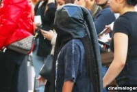 North West Adopts Kanye’s Signature Masked Look In Paris