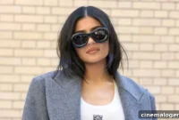 Kylie Jenner Slays In White Crop Top & Leather Jacket While Travis Scott Cheating Rumors Swirl