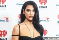 Dua Lipa Turns Heads in Black Bustier Dress at Jingle Ball