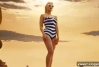 Margot Robbie Dazzles In Iconic Barbie Swimsuit For Live-Action Teaser