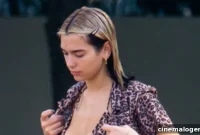 Dua Lipa Makes Waves Paddleboarding in Her Sleek Black Bikini
