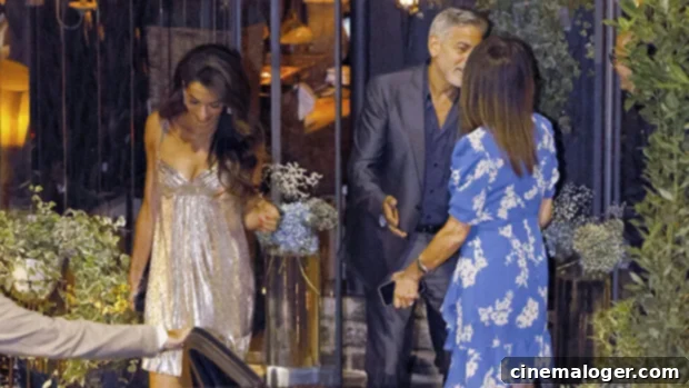 Amal Clooney's Silver Sparkle Illuminates Lake Como Date 1 featured 5143834