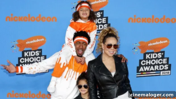 Nick Cannon Shares Sweet Snuggles With Twins Monroe & Moroccan, 12, At Sugar Factory NYC 1 featured 5149453