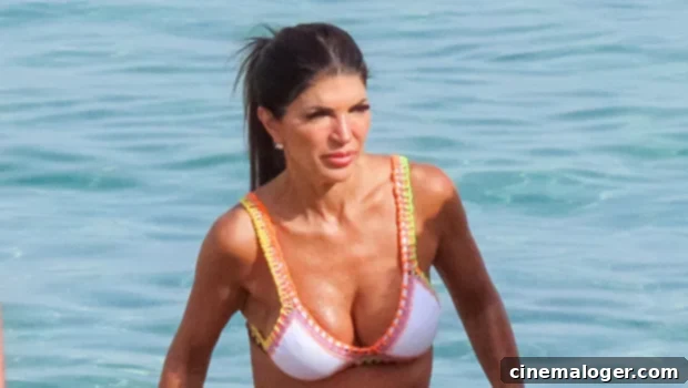 Teresa Giudice Heats Up Miami in a Bold Purple and Green Plunge Swimsuit 1 featured 5251927