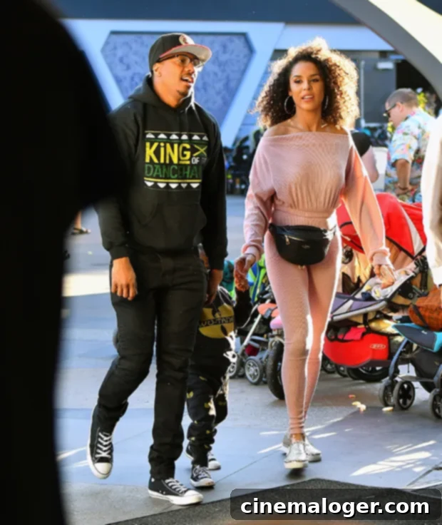 Brittany Bell: Her Story as Nick Cannon's Partner and Mother of Two 2 Brittany Bell, Nick Cannon, and their son Golden Cannon enjoying a family day at Disneyland.