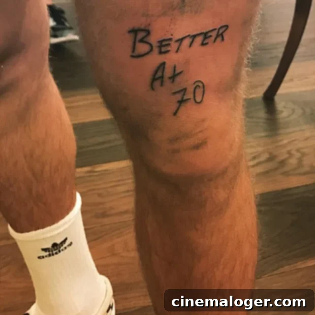 Justin Bieber's 'Better At 70' Tattoo: A Massive New Reveal 2 Justin Bieber's new 'Better at 70' leg tattoo, showing a close-up of the ink