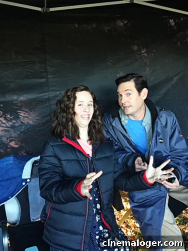 Lulu Wilson Spills on Hill House and Whats Next 2 Lulu Wilson shares a candid behind-the-scenes moment from The Haunting of Hill House set, possibly with another cast member or crew member, hinting at the camaraderie amidst the horror.