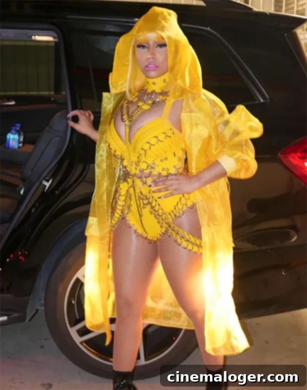 Nicki Minaj Stuns With Plunging Chain Link Bodysuit and Vibrant Yellow Hair 2 Nicki Minaj