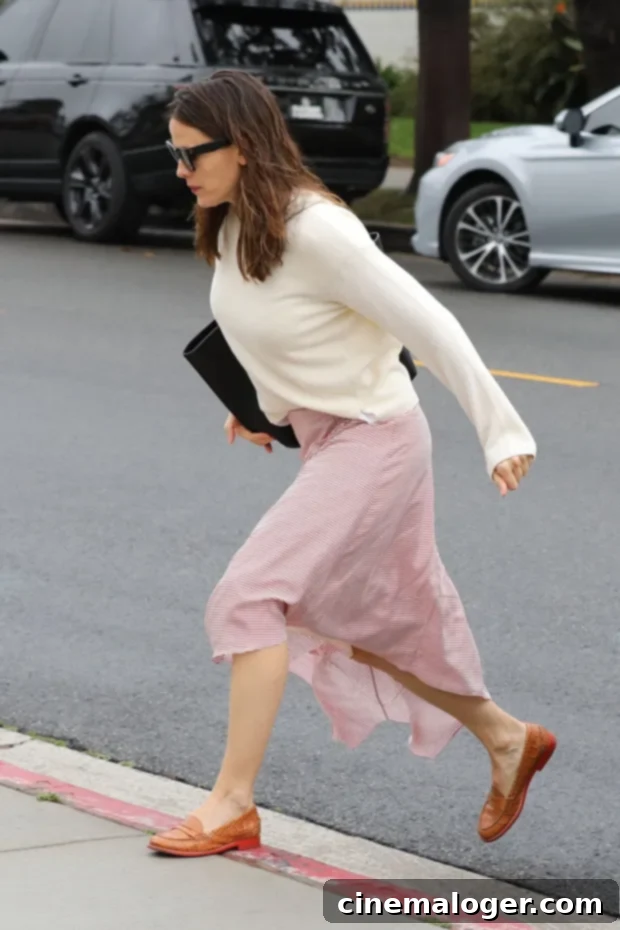 Pacific Palisades, CA - Jennifer Garner and Ben Affleck don't let the rain stop them as they arrive for Sunday church services. The pair, who are committed to coparenting their kids, arrived in separate cars, with the kids riding with Ben in the Range Rover, and Jen arriving with wet hair in the Lexus sedan. Ben looks like he's stepping up and taking parenting duties seriously, as he and eldest daughter Violet shared a sweet bonding moment as they entered the church together.Pictured: Jennifer Garner BACKGRID USA 3 FEBRUARY 2019 BYLINE MUST READ: Lastarpix / BACKGRID USA: +1 310 798 9111 / usasales@backgrid.com UK: +44 208 344 2007 / uksales@backgrid.com *UK Clients - Pictures Containing Children Please Pixelate Face Prior To Publication*