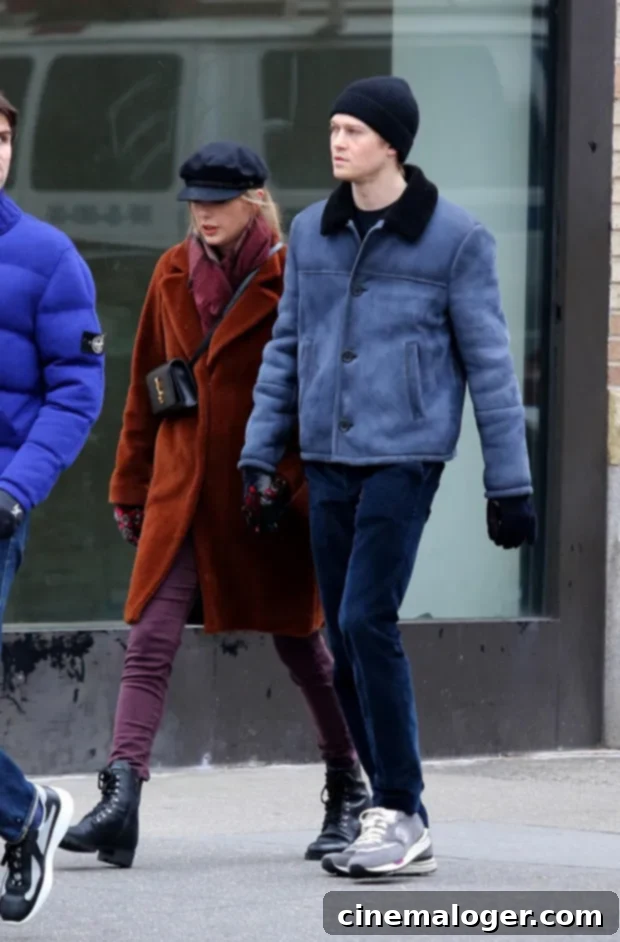 Joe Alwyn Turns 30 12 Sweet Public Photos With Taylor Swift 2 Taylor Swift and Joe Alwyn holding hands during a rare public appearance in London.