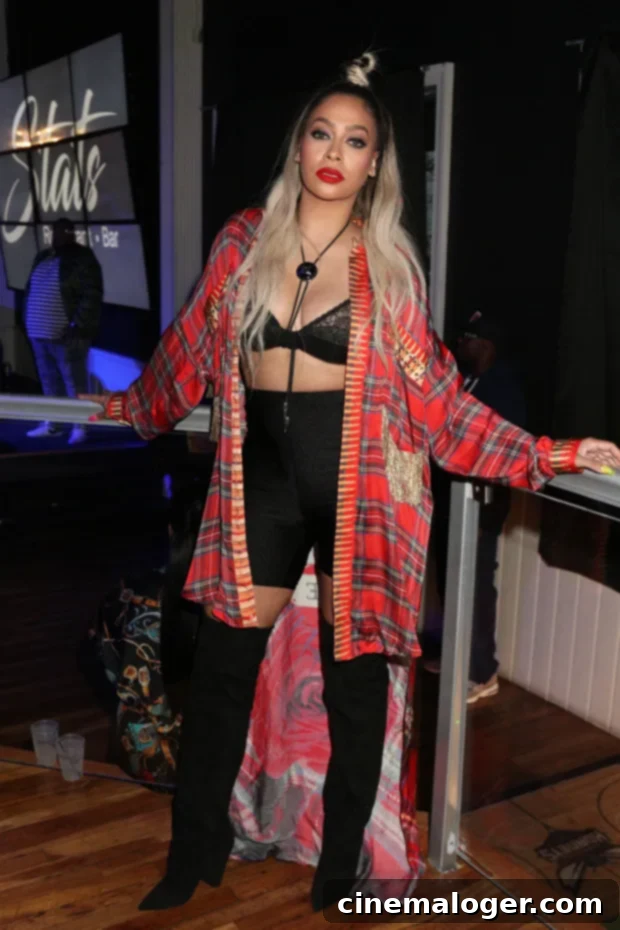 La La Anthony, 39, Sizzles in Lace Bra Top Following Carmelo Reunion 2 La La Anthony in a stunning outfit with a top bun at her NBA All-Star Weekend party, exuding confidence and style.