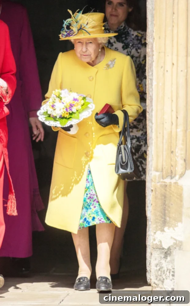 Queen Elizabeth Shines In Feathered Yellow Easter Outfit 2 Queen Elizabeth