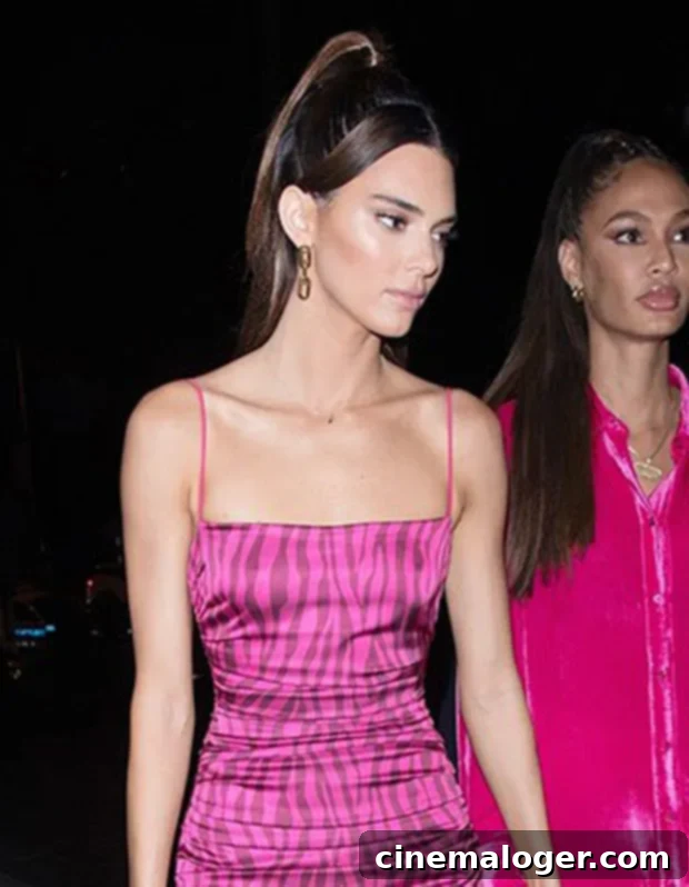 Gigi Hadid, Kendall Jenner And 18 Stars Show How Easy High Ponytails Can Be 3 Kendall Jenner in a high ponytail with middle-parted bangs