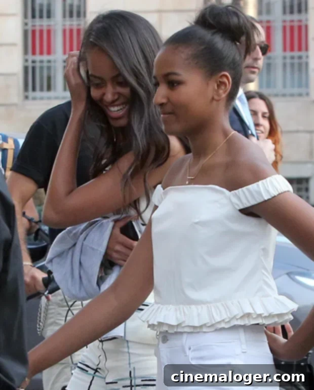 Michelle Obama's Sweet Secret: Daughters' First Kisses Were in the White House 2 Sasha Malia Obama