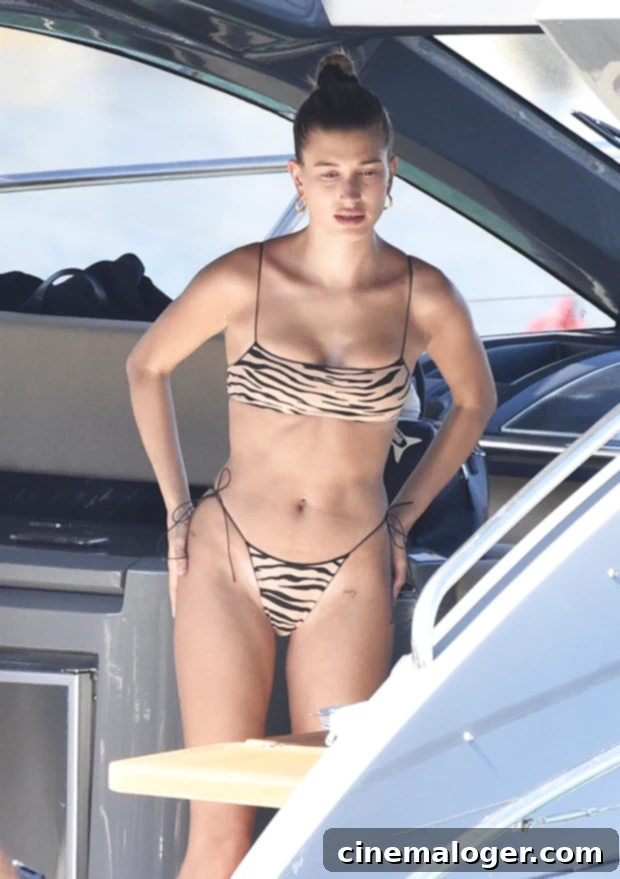 9 Stunning Celebrities on the Beach in Bikinis: Sofia Richie, Hailey Baldwin and More 2 Hailey Baldwin's zebra print bikini in Italy