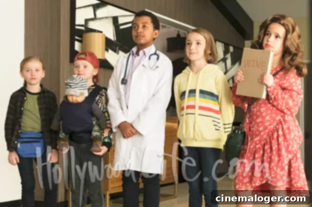 Single Parents Exclusive Photos: Kids Impersonate Parents For Halloween 2 The 'Single Parents' kids dressed as their parents for Halloween. Emma and Amy as Will and Miggy with baby dolls, Graham as Poppy in a red dress, Rory as Douglas in a doctor's uniform, and Sophie as Angie.