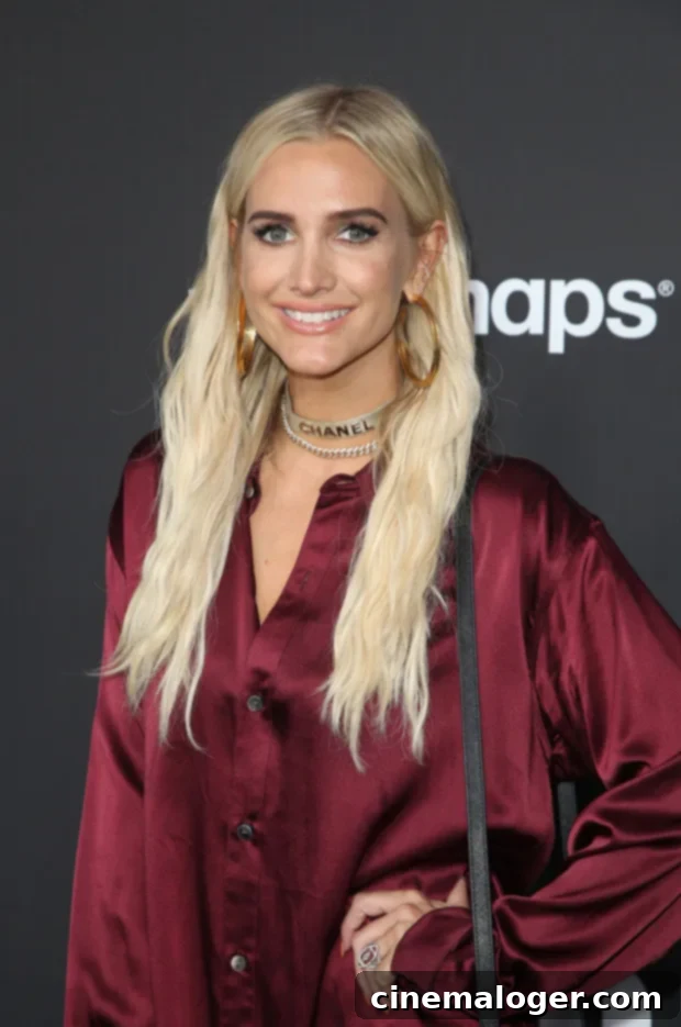 Ashlee Simpson's Blonde To Pastel Pink Fall Hair Evolution 2 Ashlee Simpson with new pastel pink hair, styled in beach waves.