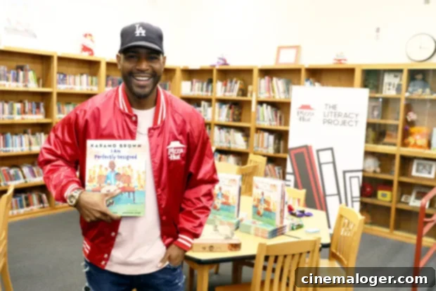 Karamo Brown: I Was DWTS's Go-To Advisor For Every Star Except Kel Mitchell 2 Karamo Brown reading to children as part of his partnership with Pizza Hut and First Book.
