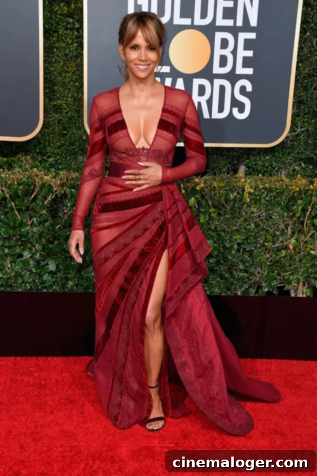 29 Stars Sizzle in Red Dresses for the Holidays: Ciara, Halle Berry and More 3 Halle Berry