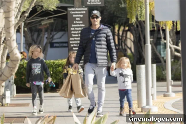Brian Austin Green: Doting Dad On Rare Outing With Three Kids 2 Brian Austin Green with his three sons, Noah, Bodhi, and Journey, during a family outing.