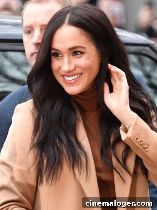 Meghan Markle Steps Out With Strikingly Longer Hair Following Royal Hiatus 2 Meghan Markle