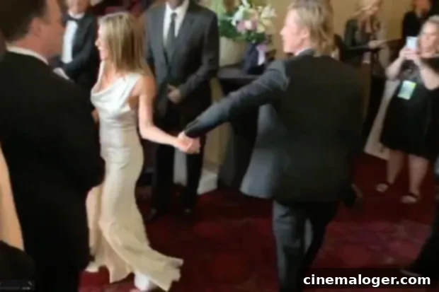 Brad Pitt's Pure Delight for Jennifer Aniston's SAG Win Fuels Backstage Reunion 2 Brad Pitt and Jennifer Aniston's SAG Awards backstage reunion