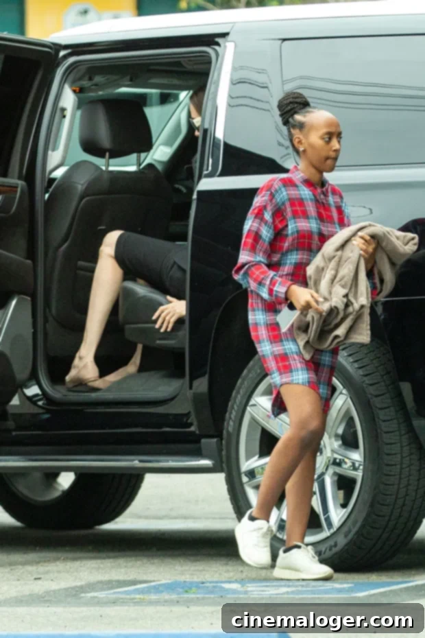 Zahara Jolie-Pitt Enjoys Post-Surgery Movie Night With Angelina And Shiloh 2 Zahara Jolie-Pitt